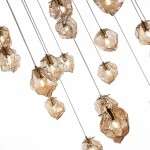 Фото 1 SL1175.303.18 Светильник подвесной ST-Luce Латунь/Янтарный E14 18*40W PORTICI